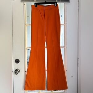 NEW Zara Orange flare trousers with belt loops & zipper closure.